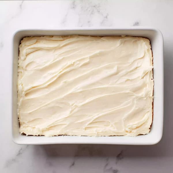 sopapilla cheesecake in a baking dish